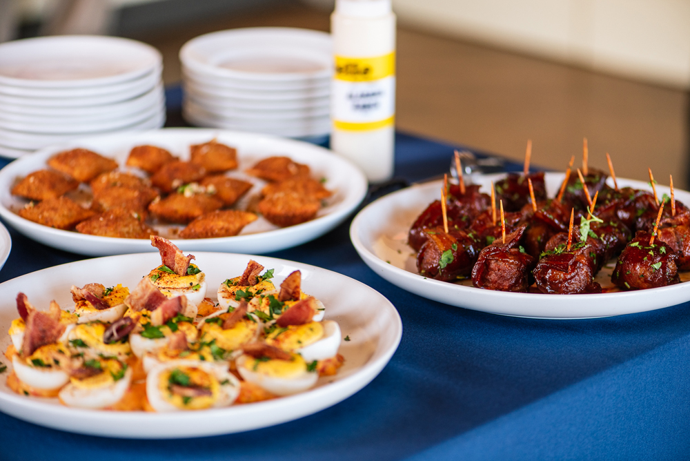 How to Choose the Right BBQ Catering Company for Your St. Louis Event 2 Assorted appetizers on white plates