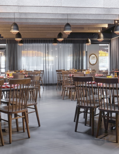 a room with tables and chairs