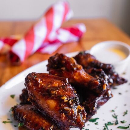 a plate of chicken wings