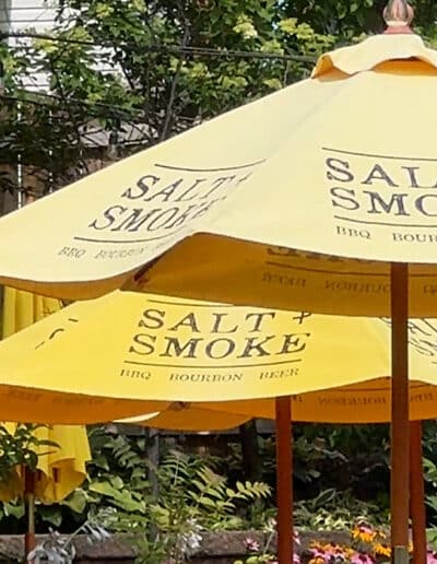 Yellow umbrellas in a garden setting