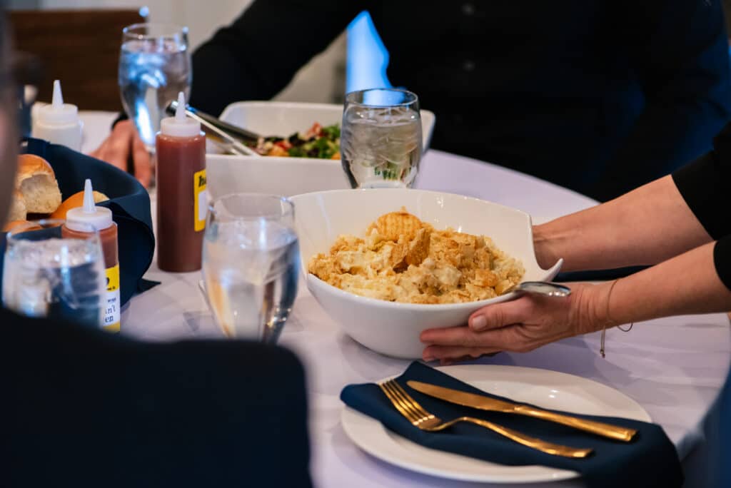 How to Choose the Right BBQ Catering Company for Your St. Louis Event 6 bbq catering in st. louis where food is being served at a dining table