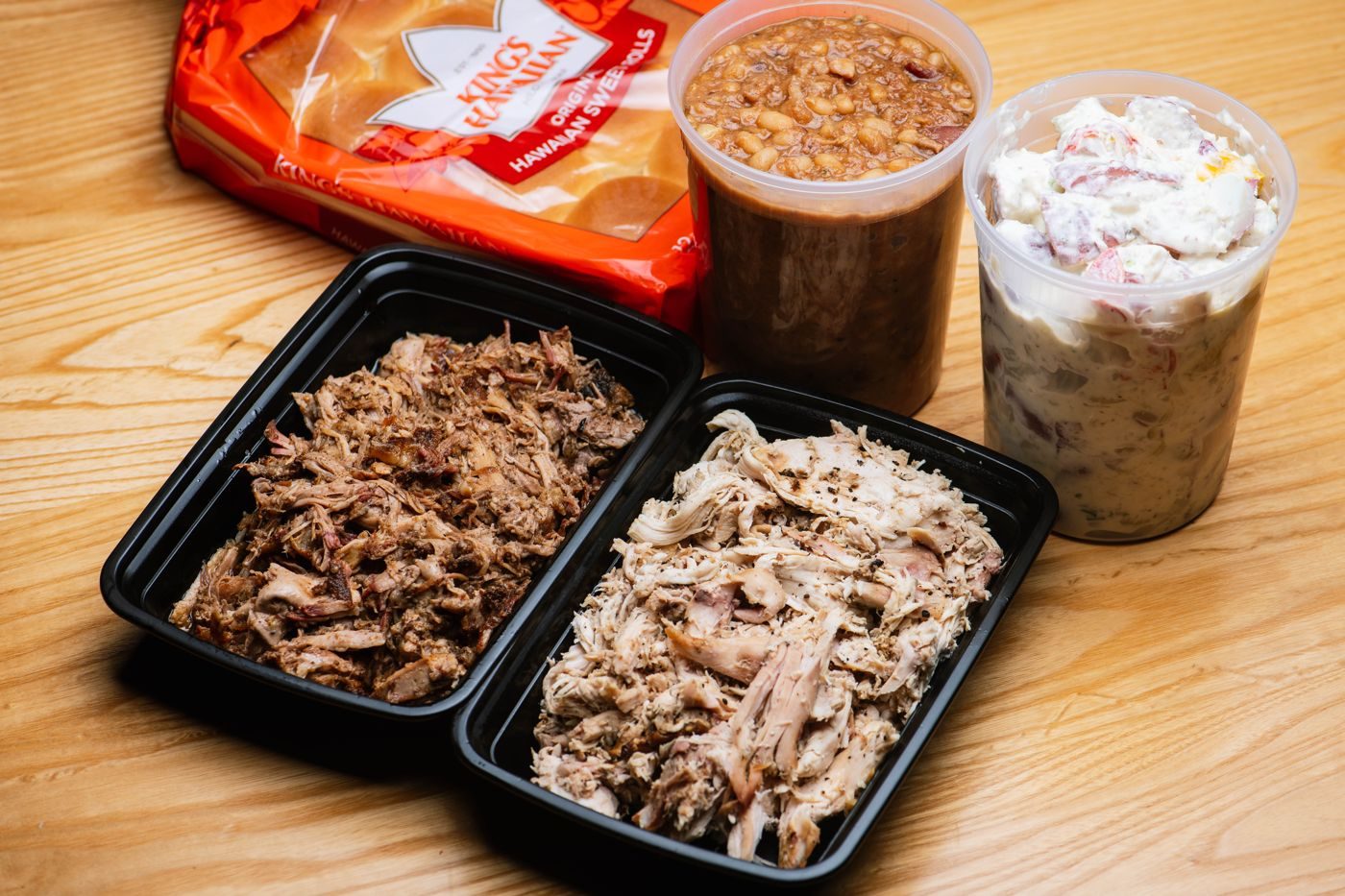 Corporate Catering 9 Pulled pork, pulled chicken, beans and potato salad packed in to-go containers