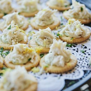 Crab and goat cheese on crisp crackers