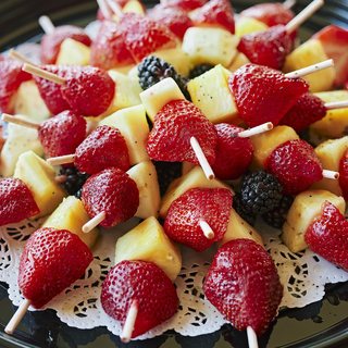 Skewers of strawberry, pineapple and blackberry