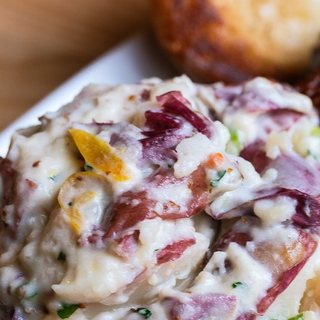A bowl of creamy potato salad