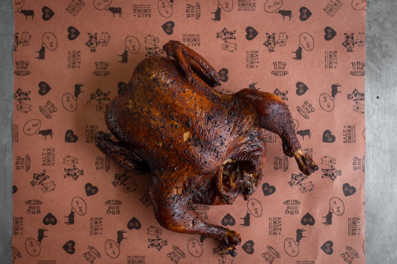 Corporate Gifting 9 A whole cherry wood smoked chicken on Salt + Smoke printed paper